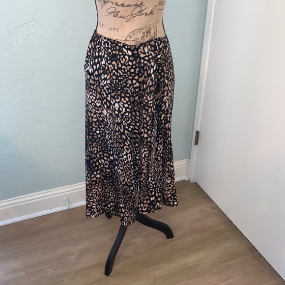 Y2K
Pull-on printed bias midi skirt faux wrap Fairy black animal print cheetah - Picture 12 of 13